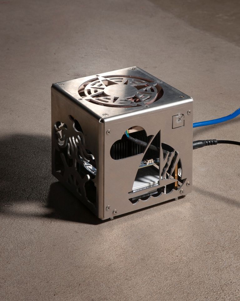 Photograph of a metal cased server-sculpture