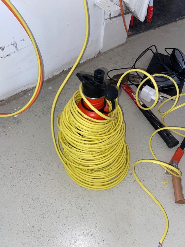 Photo of a bottle wrapped in an ethernet cable