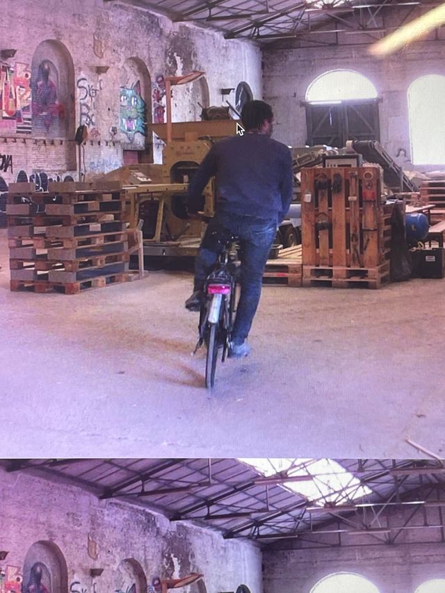 photo of man on bicycle